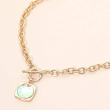 Load image into Gallery viewer, Round Faceted Stone Accent Frame Toggle Pendant Necklace: Cream