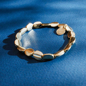 Oval Smooth Shiny Gold Beaded Stretch Bracelet